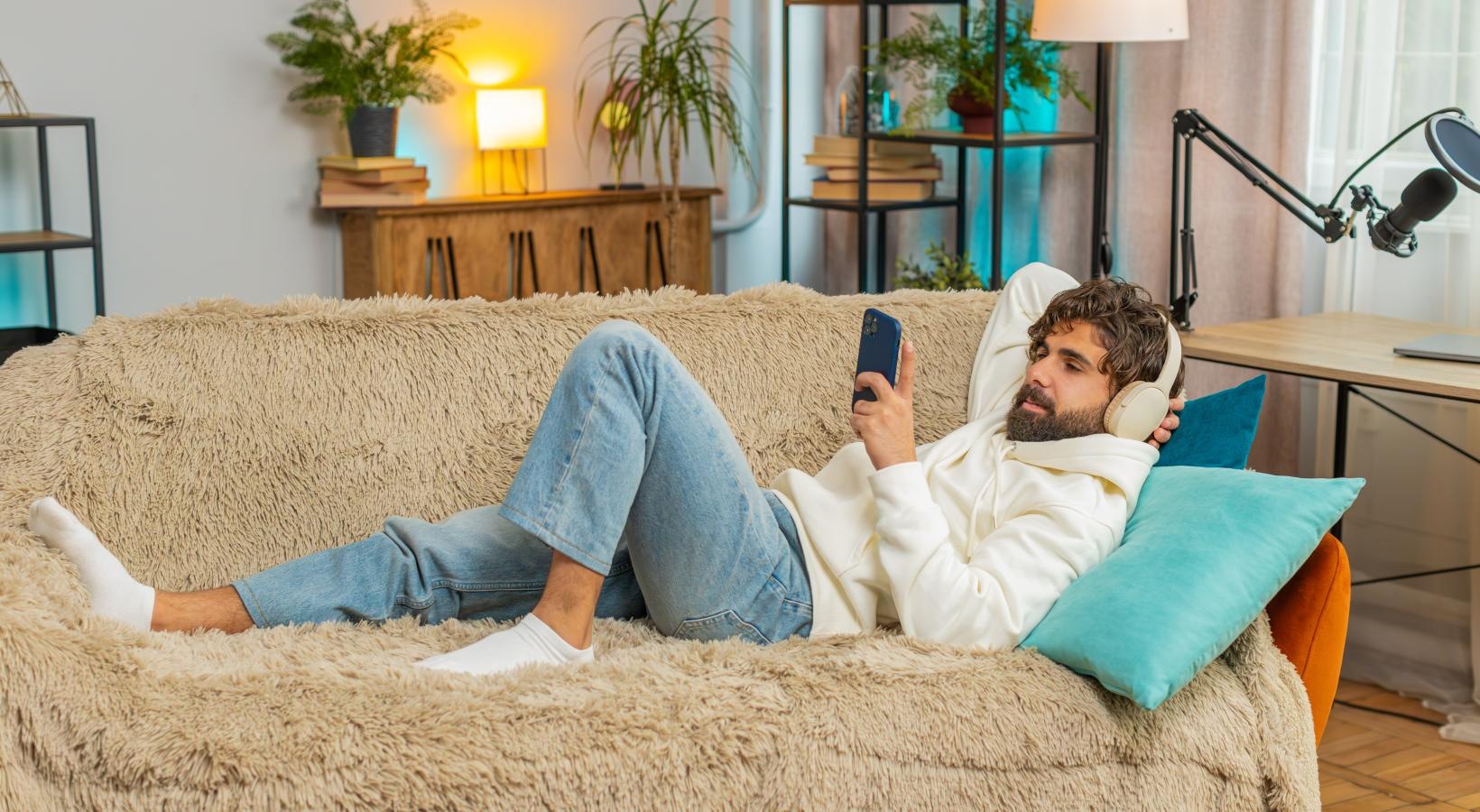 Settle into comfort at Artisan on 18th a person lying on a couch
