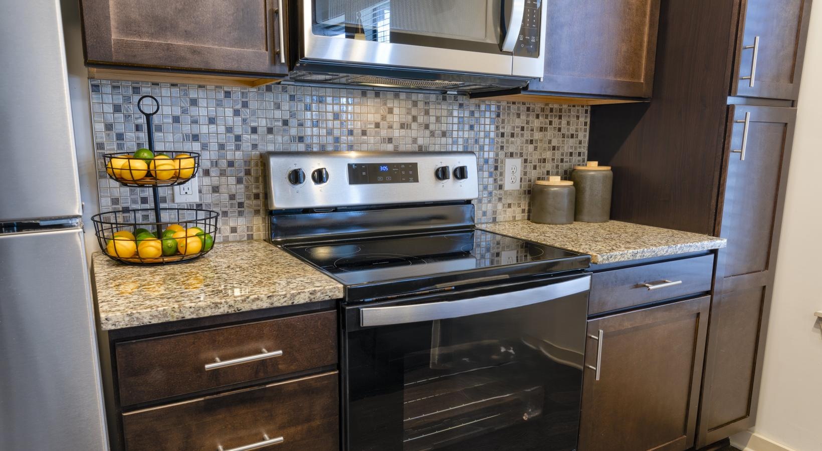 Beautiful kitchens with designer finishes a kitchen with stainless steel appliances