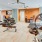 a room with exercise equipment and kettle bells