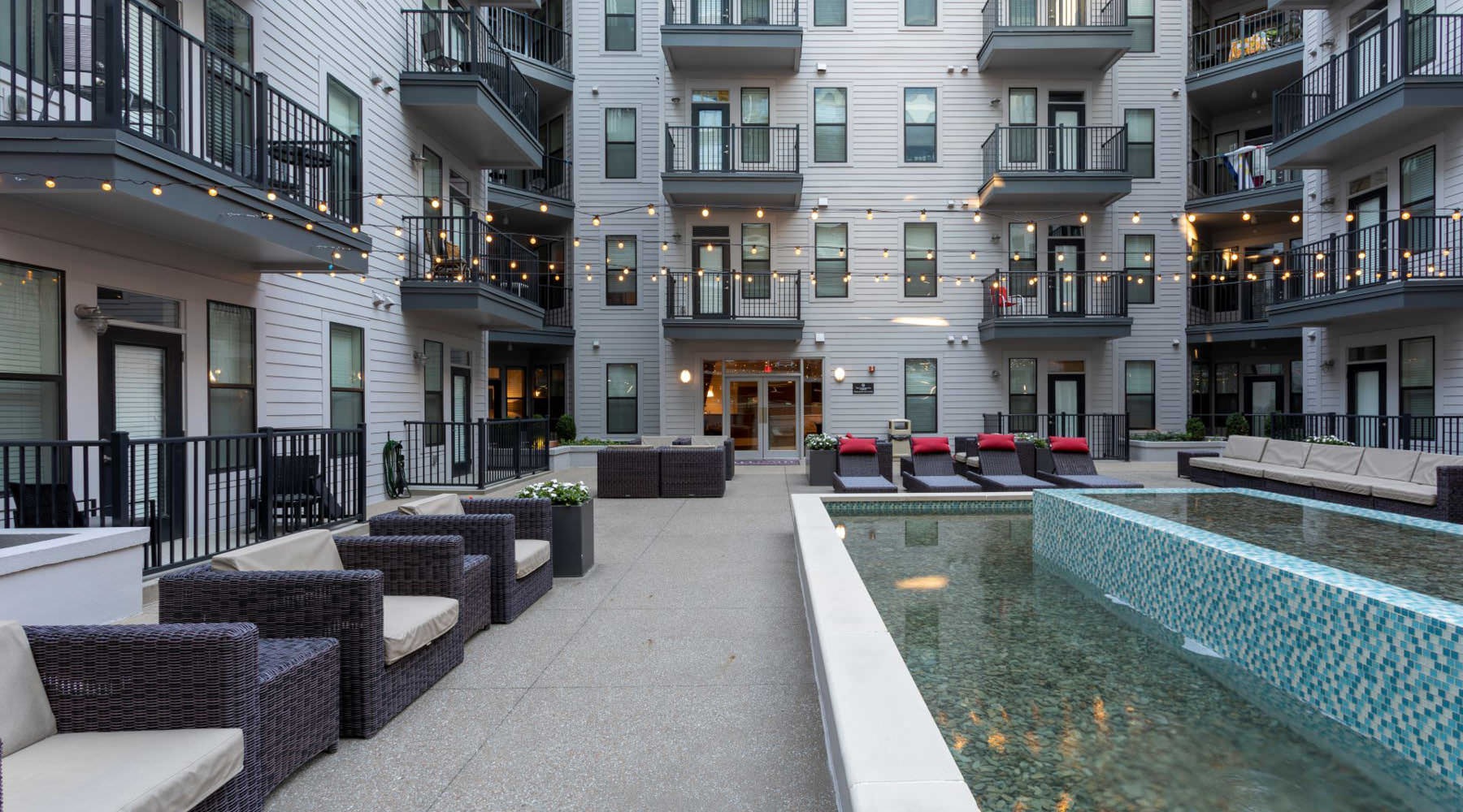 Access to resident-only features a pool in a courtyard between buildings