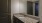 a bathroom with a marble countertop