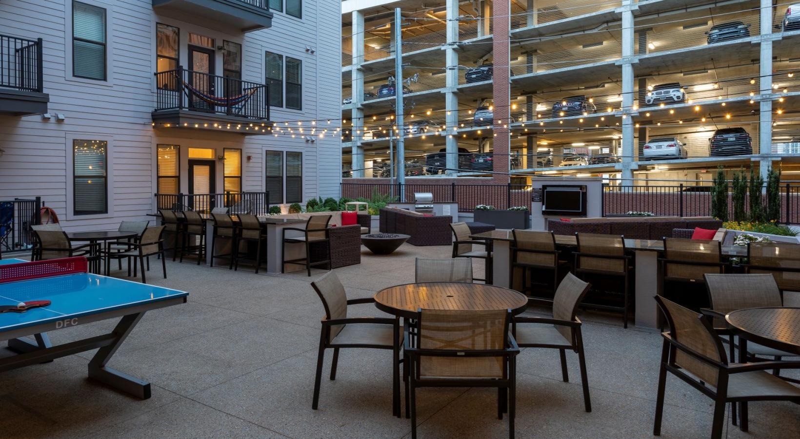 The essence of exceptional living a courtyard with tables and chairs