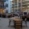 a courtyard with tables and chairs
